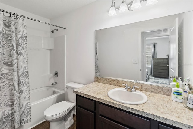 bathroom with toilet, vanity, and shower / bathtub combination with curtain