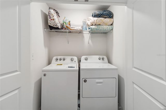 laundry room with laundry area and washer and dryer