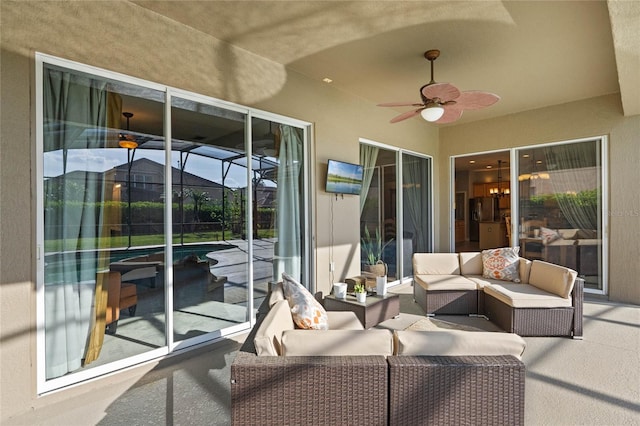 view of patio featuring outdoor lounge area and ceiling fan