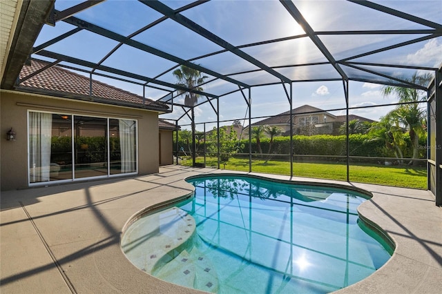 outdoor pool featuring a patio, a yard, and a lanai