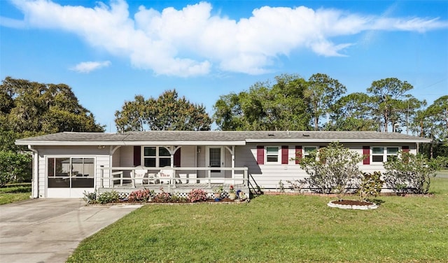 single story home featuring a front yard and covered porch