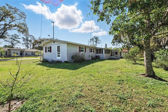 exterior space with a lawn