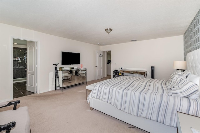 carpeted bedroom featuring visible vents and a textured ceiling