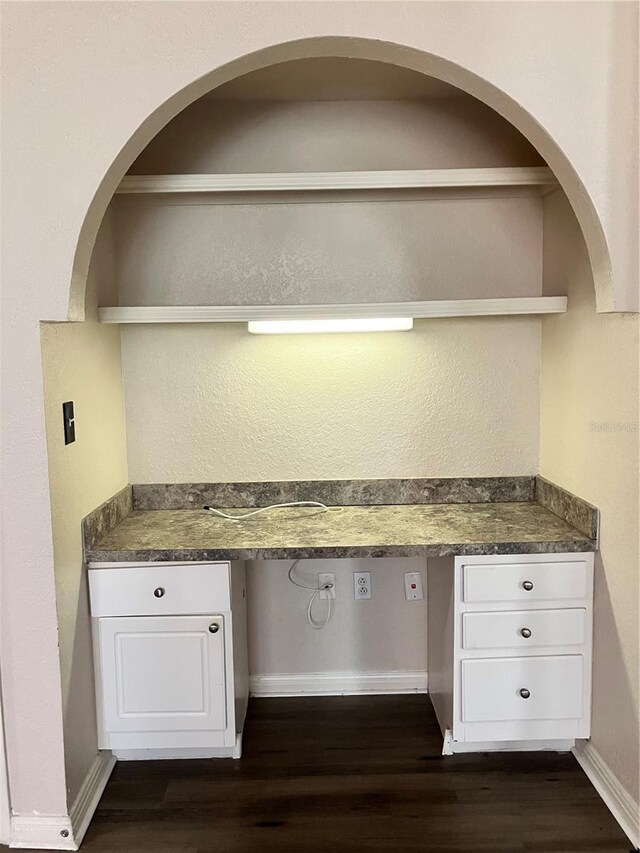 911 N Orange Ave Unit 142, Orlando, FL 32801 - detailed view of wood finished floors and baseboards