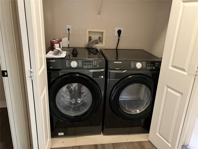 911 N Orange Ave Unit 142, Orlando, FL 32801 - laundry area with independent washer and dryer