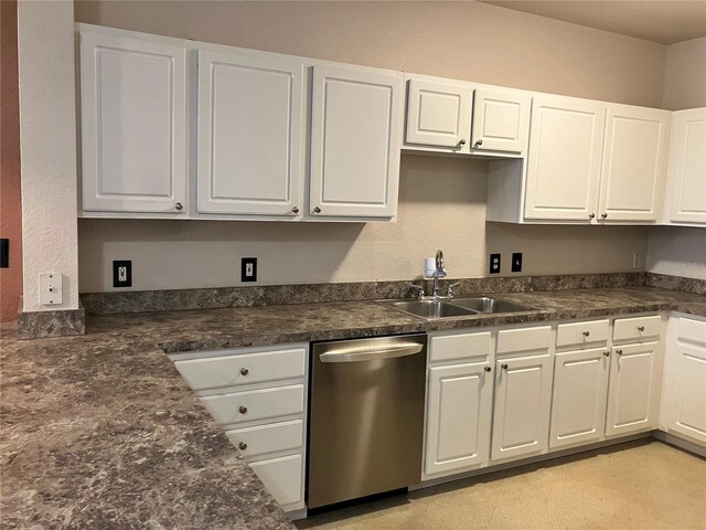 911 N Orange Ave Unit 142, Orlando, FL 32801 - kitchen with dishwasher, a sink, white cabinets, and dark countertops