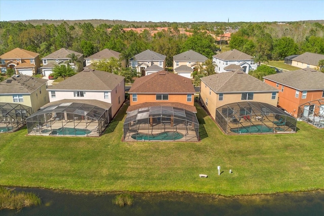 aerial view with a residential view and a water view