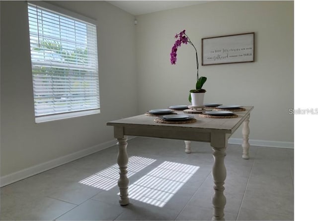 tiled office featuring baseboards