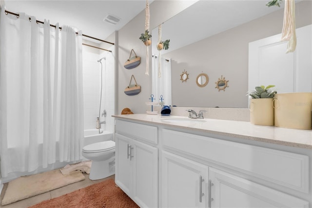 204 Taft Dr, Davenport, FL 33837 - bathroom with visible vents, vanity, tile patterned floors, toilet, and shower / tub combo with curtain