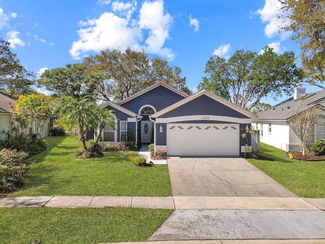 ranch-style home with stucco siding, a front lawn, concrete driveway, and an attached garage