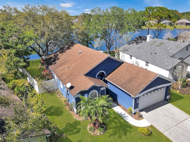 birds eye view of property featuring a water view