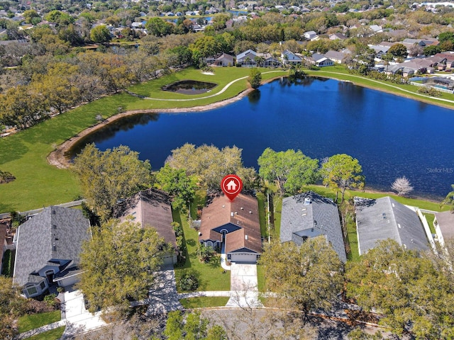 birds eye view of property featuring a residential view and a water view