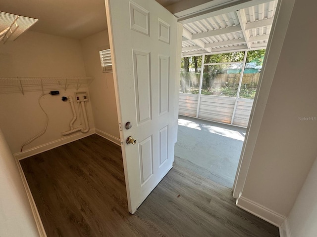 laundry area with baseboards, washer hookup, and dark wood-style flooring