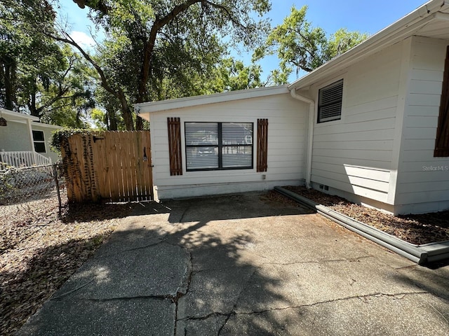 property entrance with fence