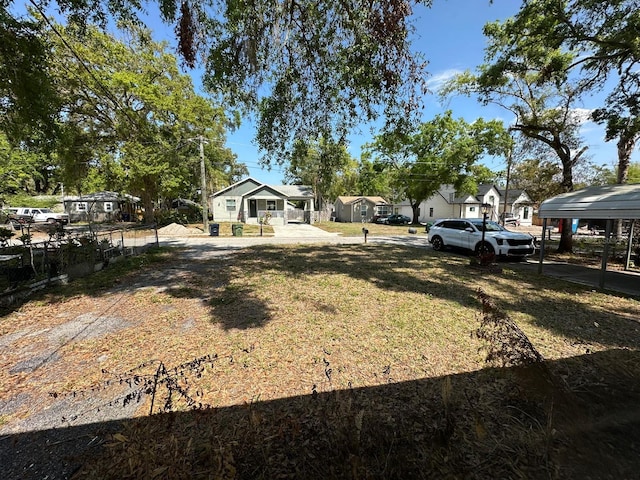 view of yard with a residential view