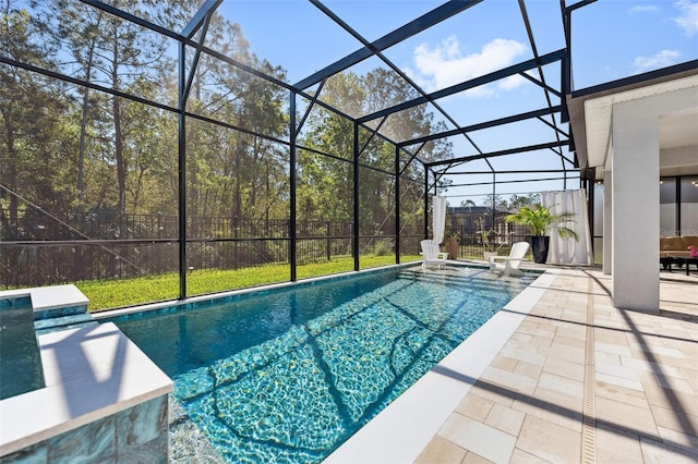 view of pool featuring a lanai, a fenced in pool, and a patio