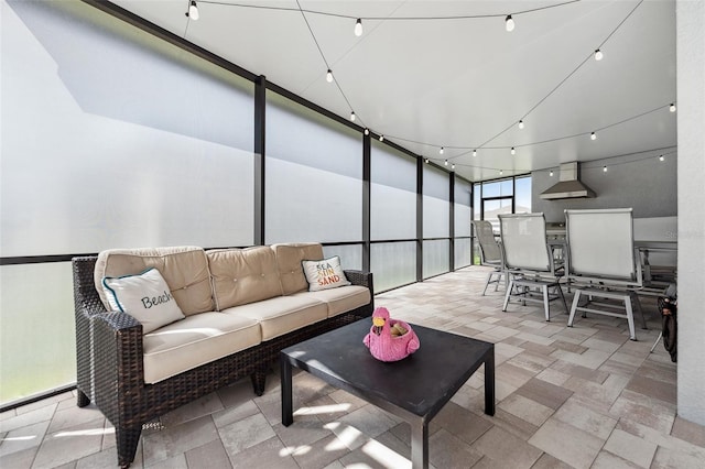 sunroom with track lighting