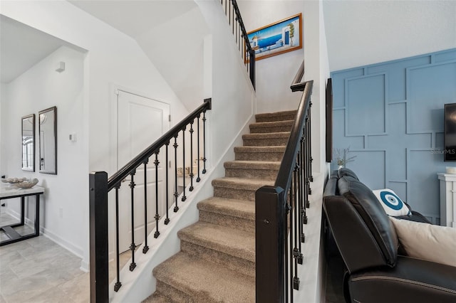 stairway with baseboards