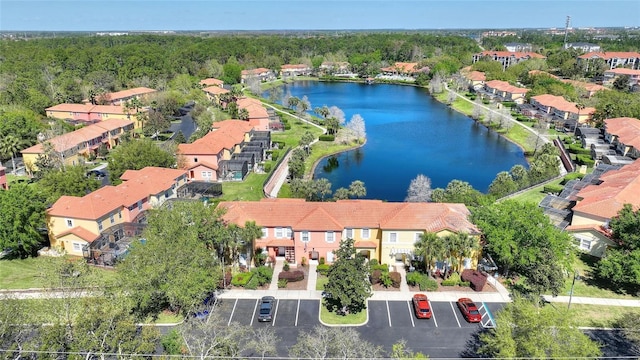 bird's eye view with a residential view and a water view