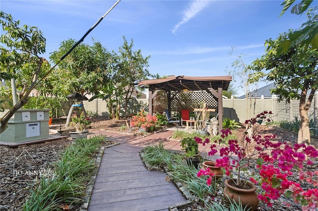 2102 Congress Ln, Saint Cloud, FL 34769 - fenced backyard with a patio and a gazebo