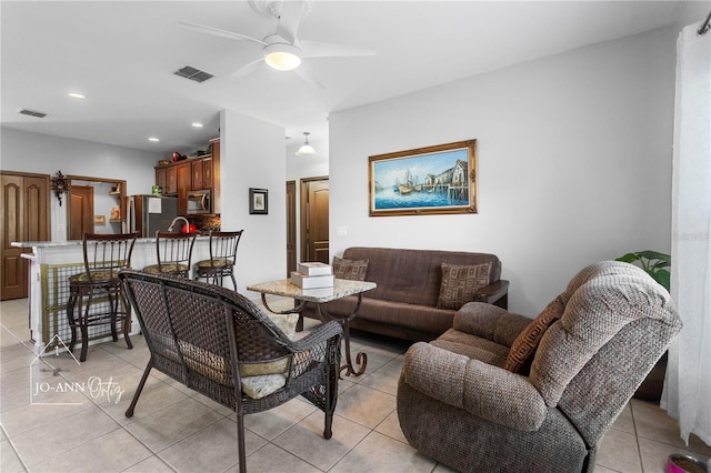 2102 Congress Ln, Saint Cloud, FL 34769 - living room featuring ceiling fan, light tile patterned flooring, and recessed lighting