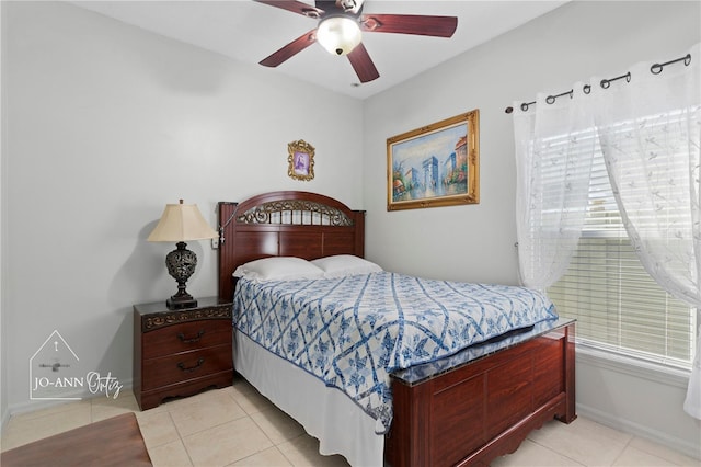 2102 Congress Ln, Saint Cloud, FL 34769 - bedroom with light tile patterned flooring and ceiling fan
