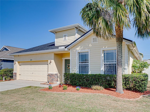 view of front of house featuring stucco siding, a front lawn, stone siding, concrete driveway, and a garage