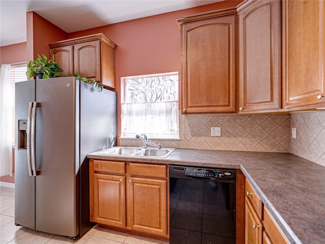 kitchen with tasteful backsplash, dishwasher, light tile patterned floors, stainless steel refrigerator with ice dispenser, and a sink