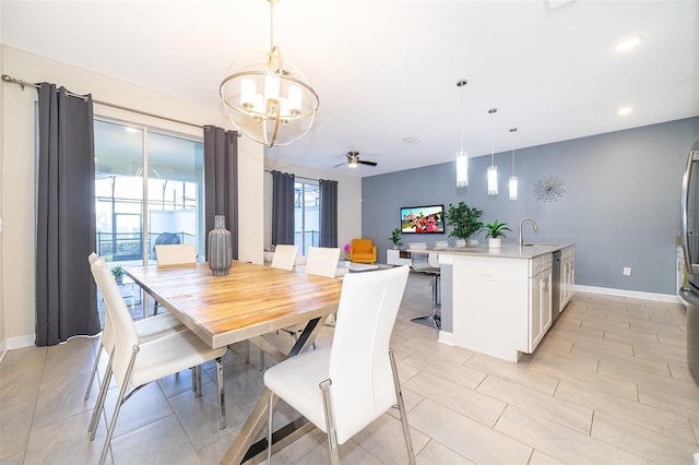 dining area with recessed lighting, ceiling fan with notable chandelier, and baseboards