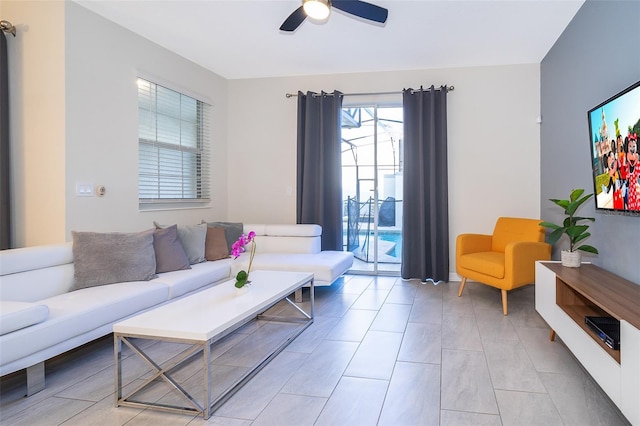 living area featuring ceiling fan