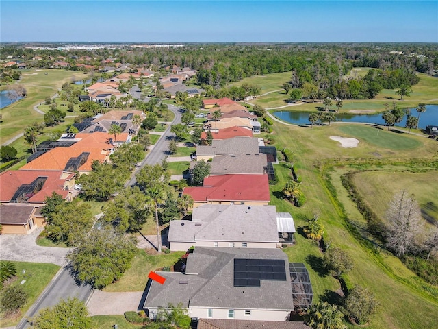 bird's eye view with a residential view, a water view, and golf course view