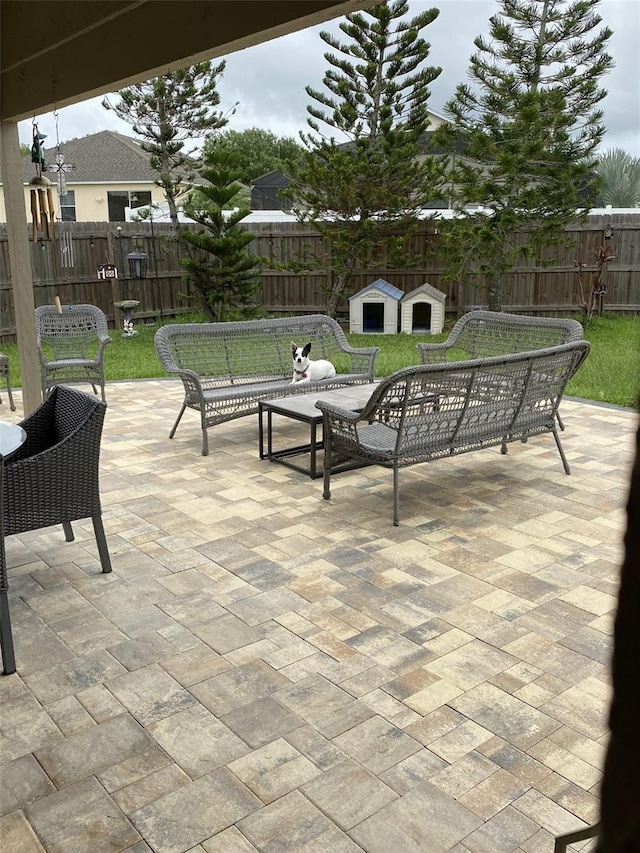 view of patio / terrace featuring fence