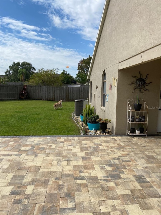 view of patio featuring a fenced backyard and cooling unit