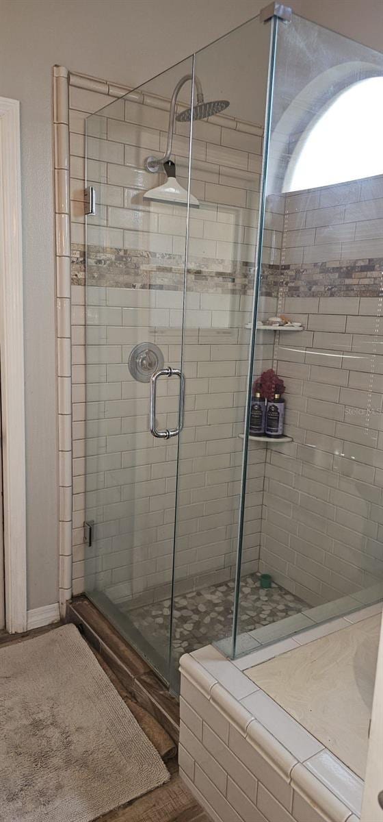 full bath featuring a stall shower
