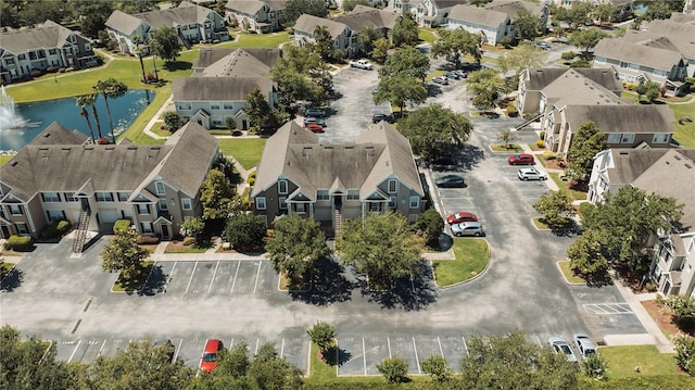 9061 Lee Vista Blvd Unit 1303, Orlando, FL 32829 - aerial perspective of suburban area with a nearby body of water