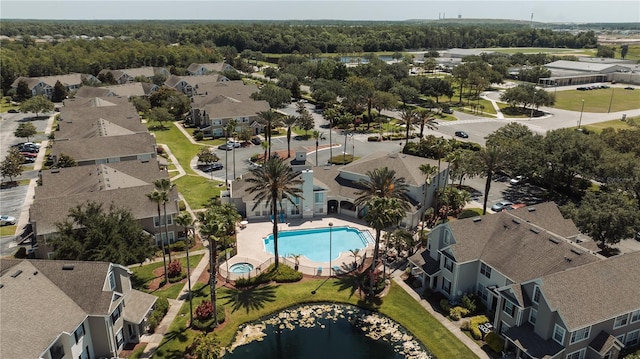 9061 Lee Vista Blvd Unit 1303, Orlando, FL 32829 - aerial view of residential area with a pool area and a large body of water