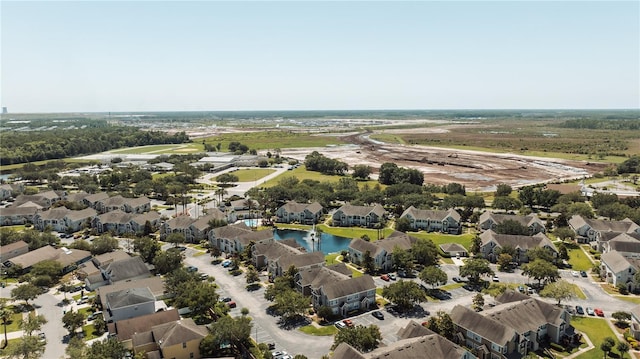 9061 Lee Vista Blvd Unit 1303, Orlando, FL 32829 - aerial perspective of suburban area with a large body of water