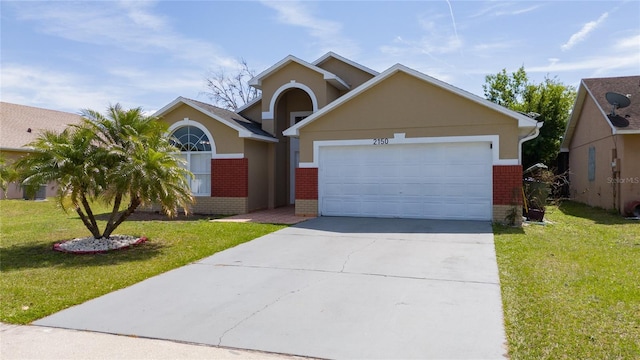 view of front of property featuring a front lawn, a garage, brick siding, and concrete driveway