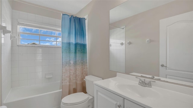 bathroom with vanity, toilet, and shower / bath combo with shower curtain