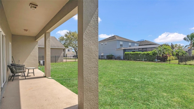 view of yard featuring a patio and a fenced backyard