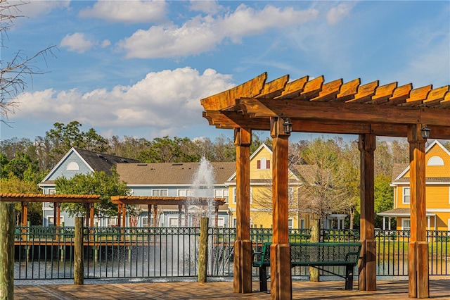 wooden terrace with a pergola