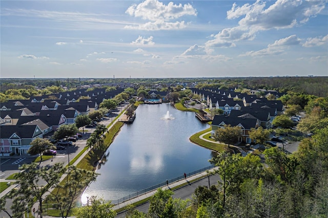 bird's eye view with a residential view and a water view