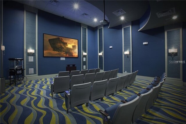 1432 Rolling Fairway Dr, Davenport, FL 33896 - carpeted home theater featuring baseboards and visible vents