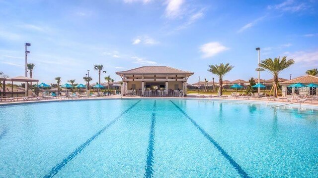 1432 Rolling Fairway Dr, Davenport, FL 33896 - pool with a patio area and a gazebo