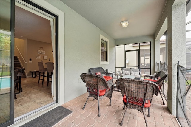 1432 Rolling Fairway Dr, Davenport, FL 33896 - sunroom / solarium featuring brick floor and outdoor lounge area