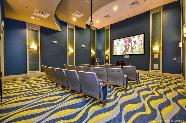 1432 Rolling Fairway Dr, Davenport, FL 33896 - home theater room featuring visible vents, baseboards, and carpet