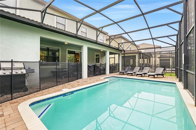 1432 Rolling Fairway Dr, Davenport, FL 33896 - outdoor pool with a patio area, a grill, and a lanai