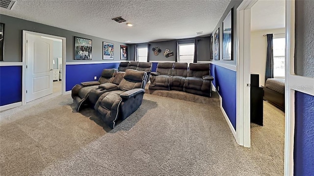 1432 Rolling Fairway Dr, Davenport, FL 33896 - carpeted home theater with a textured ceiling, baseboards, and visible vents