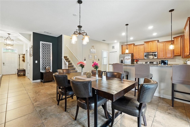1432 Rolling Fairway Dr, Davenport, FL 33896 - dining area featuring visible vents, baseboards, light tile patterned floors, stairway, and recessed lighting
