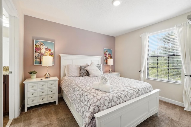 1432 Rolling Fairway Dr, Davenport, FL 33896 - bedroom with dark colored carpet and baseboards